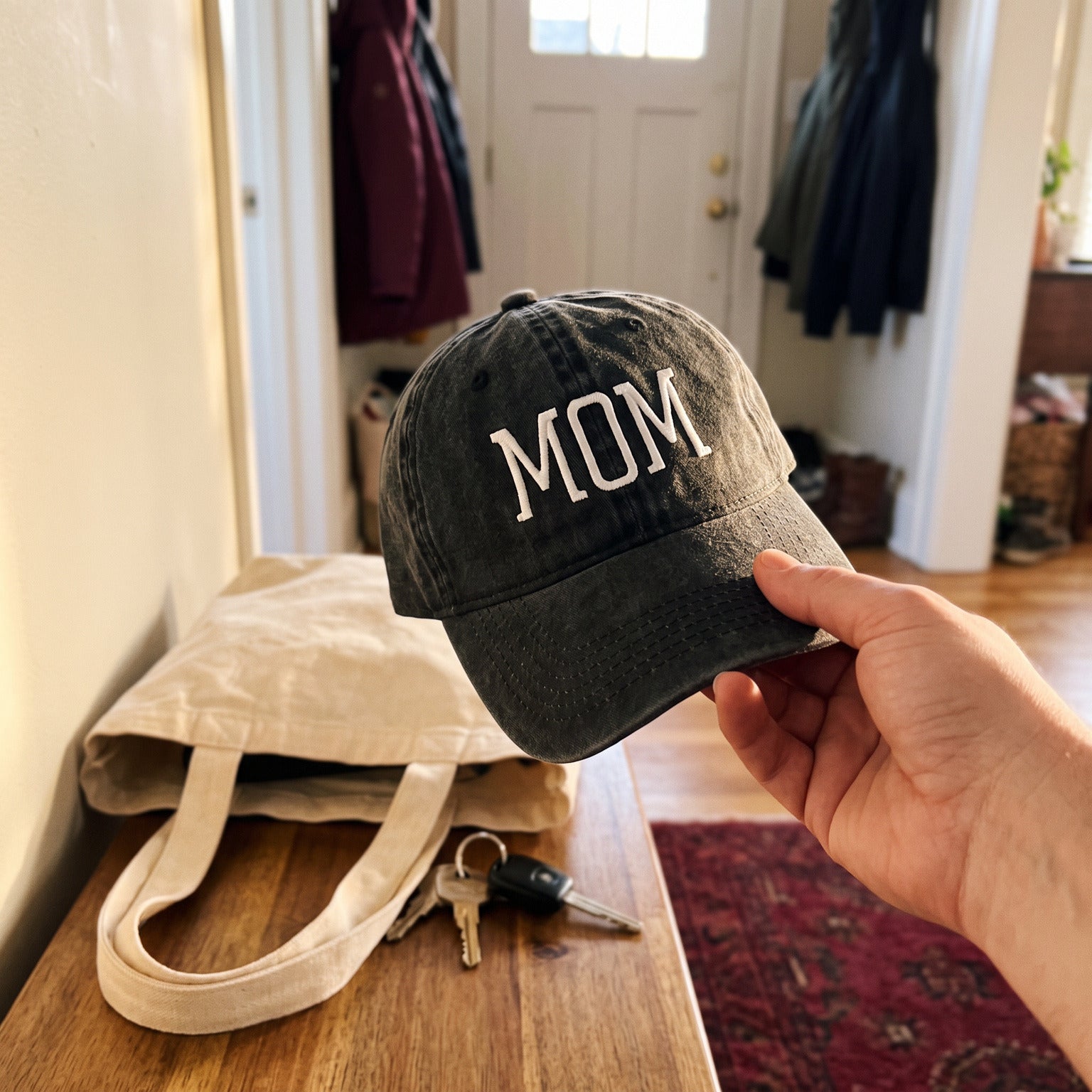 Black MOM cap and tote ready for school pickup